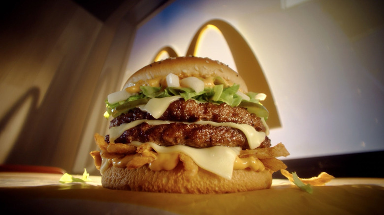 A close-up of a McDonald's Big Arch sandwich