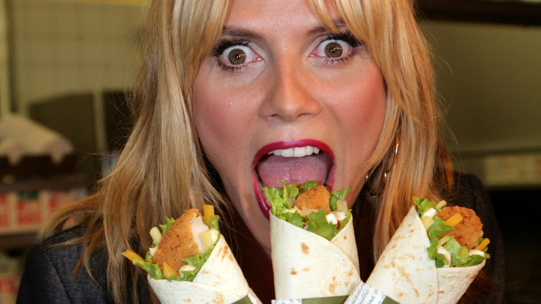 Heidi Klum poses with McDonald's wraps in 2008