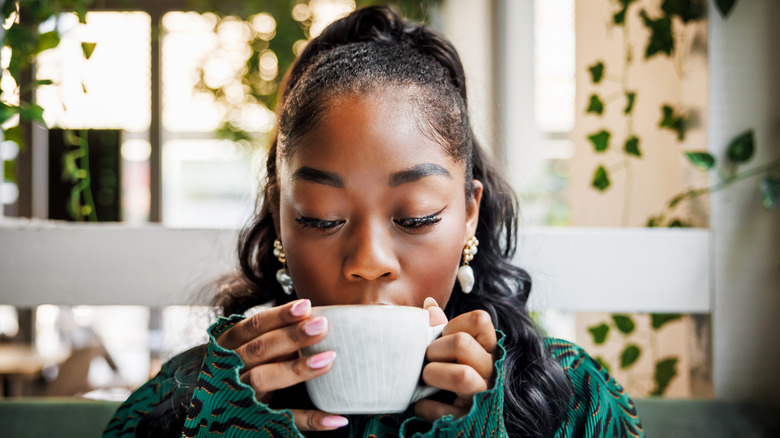 Woman drinking coffee