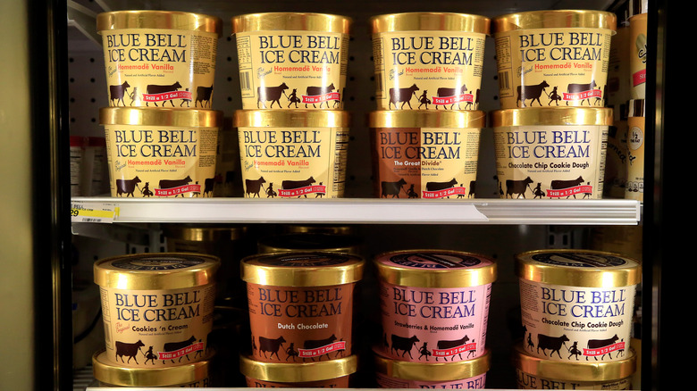 Pints of Blue Bell ice cream in a freezer