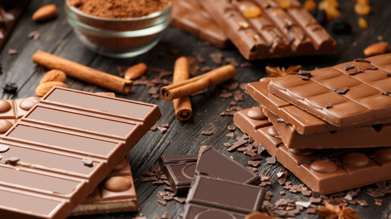 Close up shot of various types of milk chocolate on a table