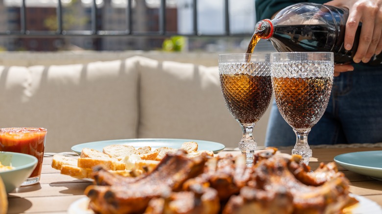 Plate of barbecue with cola