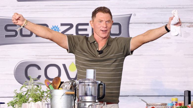 Bobby Flay with arms stretched out