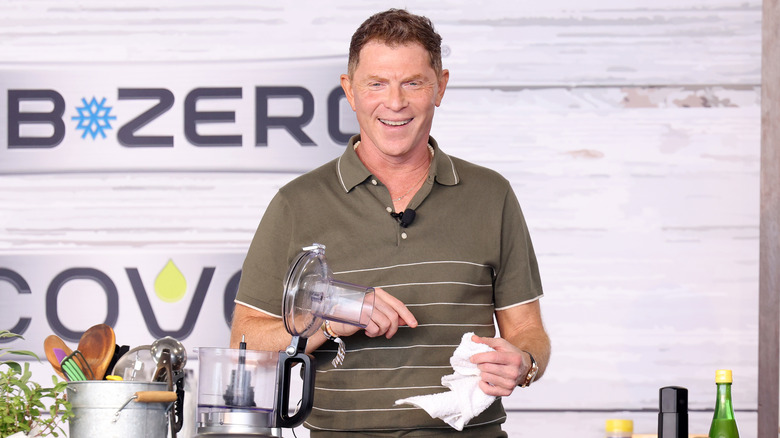 Bobby Flay cooking onstage at the South Beach Food and Wine festival