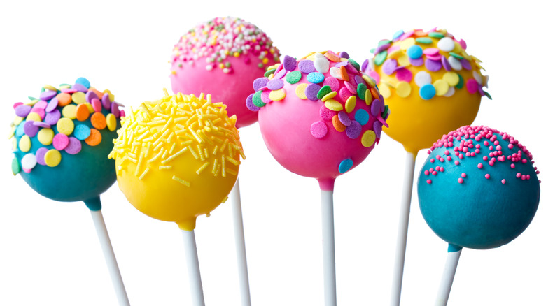 Bright colorful cake pops with assorted sprinkles