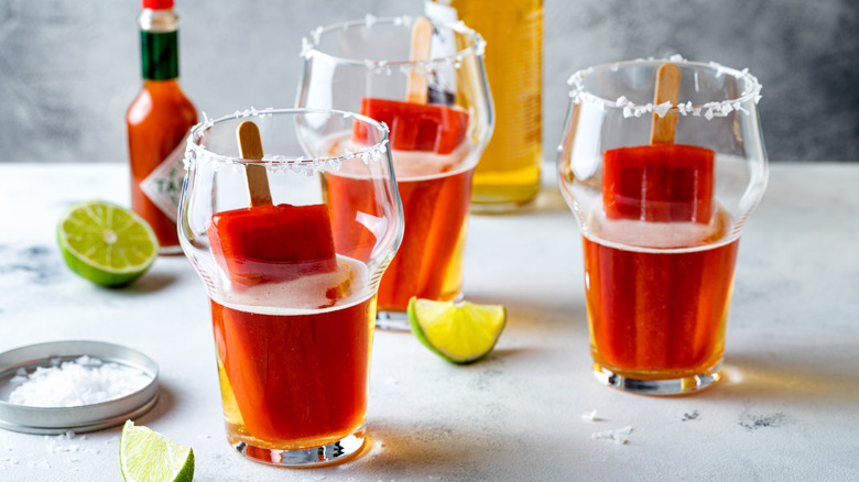 michelada popsicles in glasses