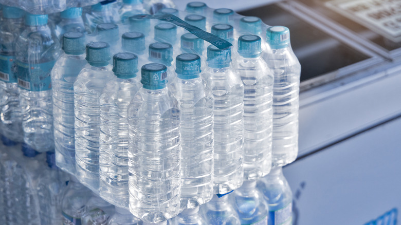 Sealed case of water bottles on a table