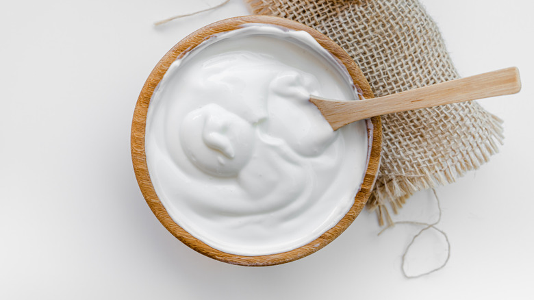 Bowl of sour cream with spoon