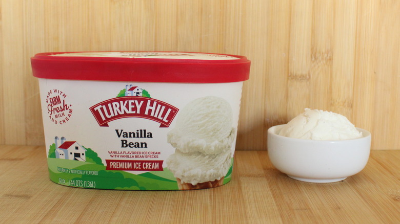 Container and bowl of Turkey Hill vanilla ice cream