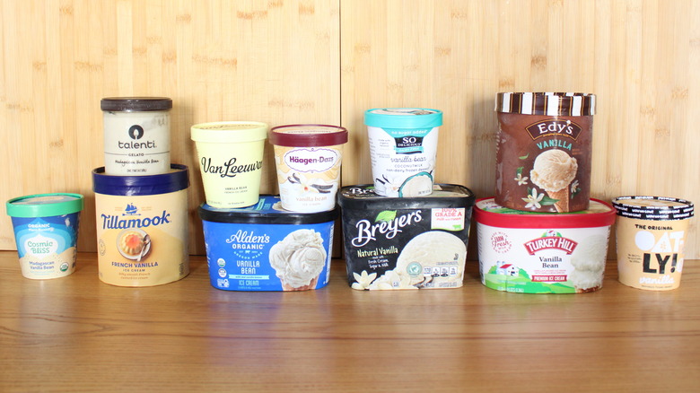 Assorted containers of frozen vanilla confections lined up