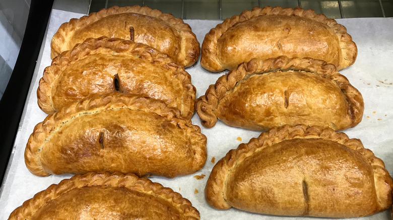 hand pies coming out of an oven