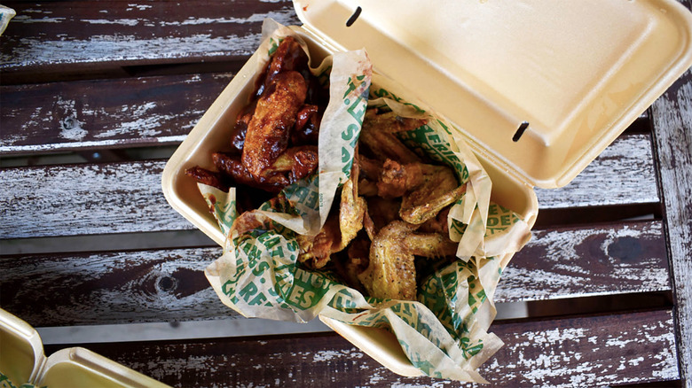 Wingstop BBQ wings in styrofoam box