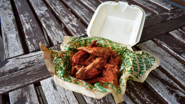 Asian wings in styrofoam container