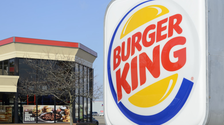 A more modern Burger King logo, rounding the sandwich shape and adding a blue crescent outline on the edge