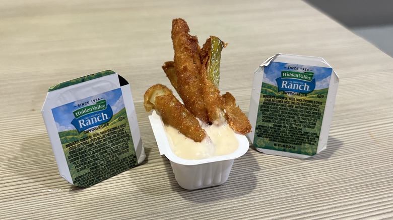 Burger King's Pickle Fries dipped in a cup of Hidden Valley Ranch