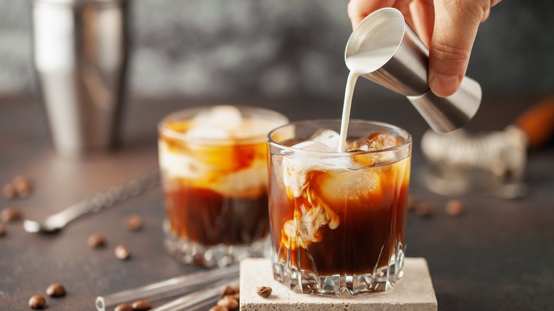 A bartender mixing a White Russian