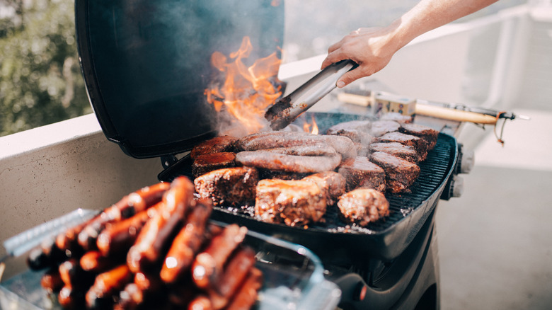 grilling meat on balcony