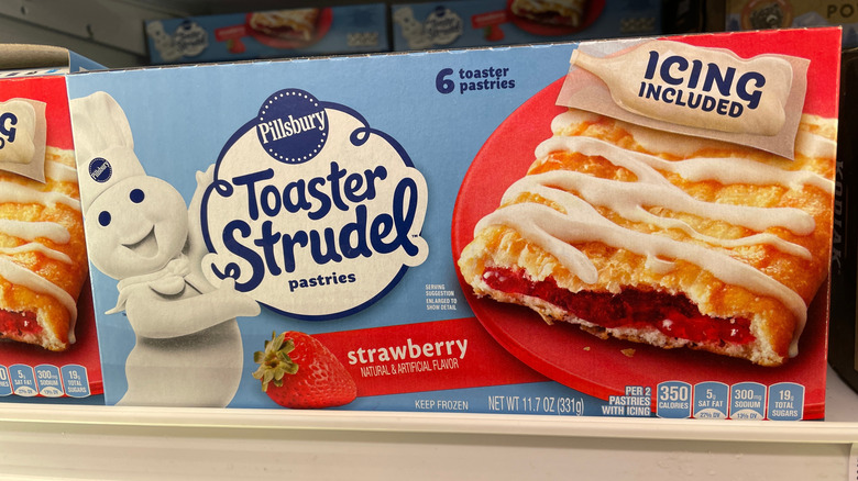 A box of Pillsbury toaster strudel sits on a supermarket shelf