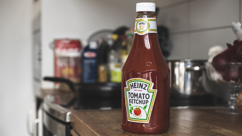 Plastic bottle of Heinz ketchup on kitchen counter