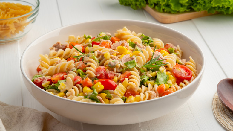 Macaroni salad in a white bowl