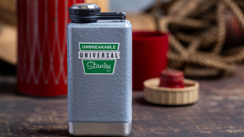 A grey Stanley flask on a counter