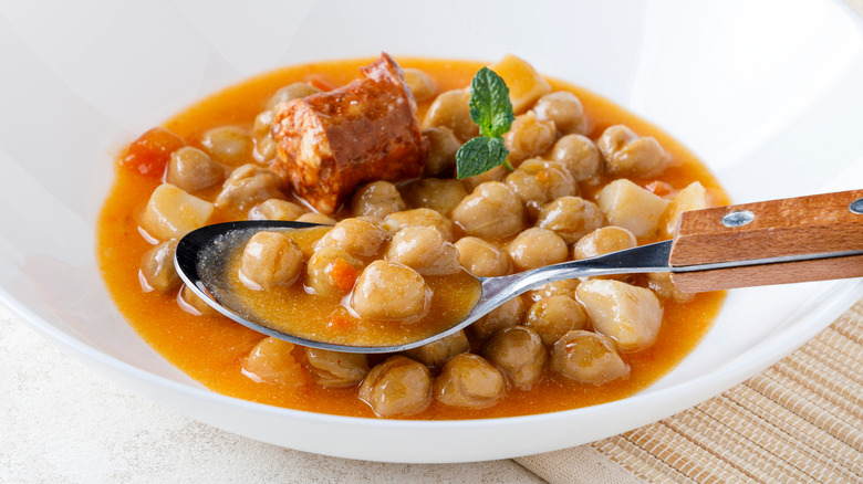 Chickpeas in bowl with spoon