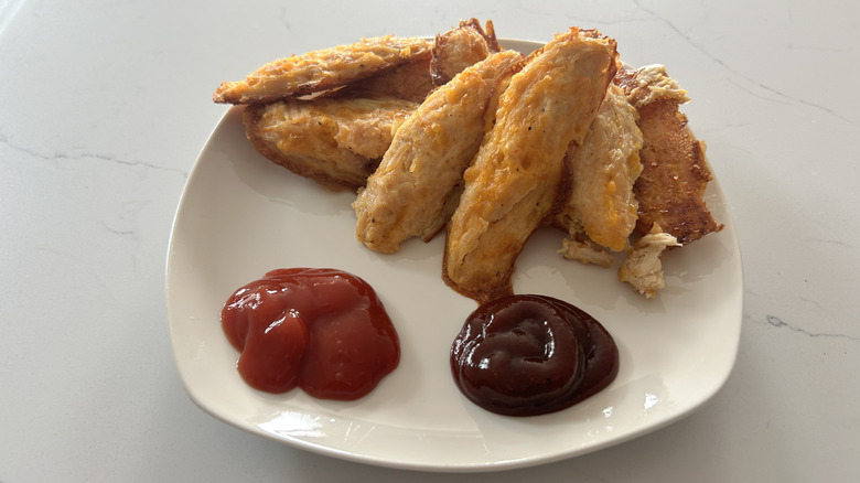 homemade chicken fries on plate with dipping sauces