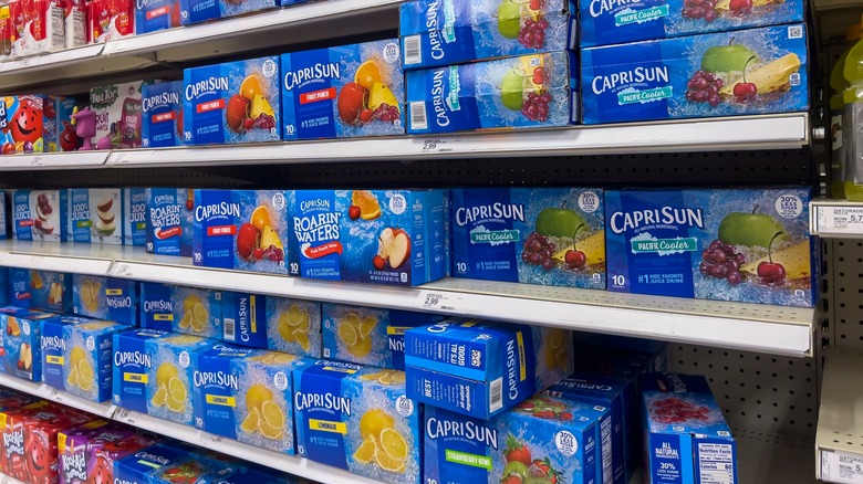 Boxes of Capri Sun on shelves