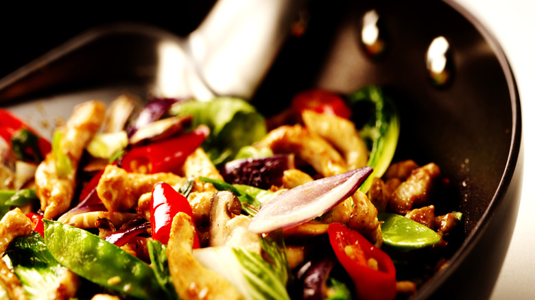 Carbon wok with stirfry.