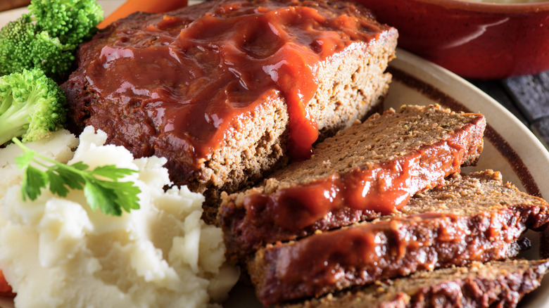 meatloaf, sauce, potato, and vegetables