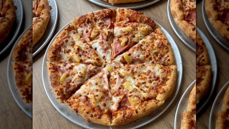 Domino's Pizza sliced on metal tray