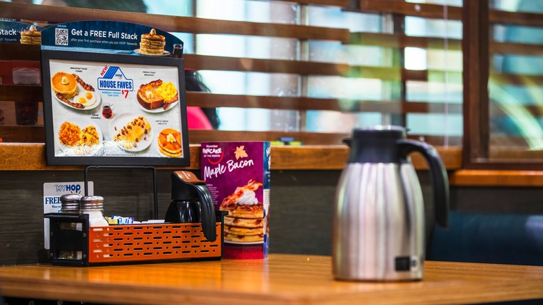 Menus and a jug on the table at IHOP