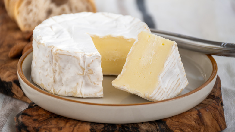 A wheel of camembert cheese.