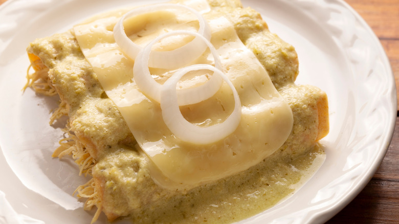 Enchiladas with cheese and white sauce