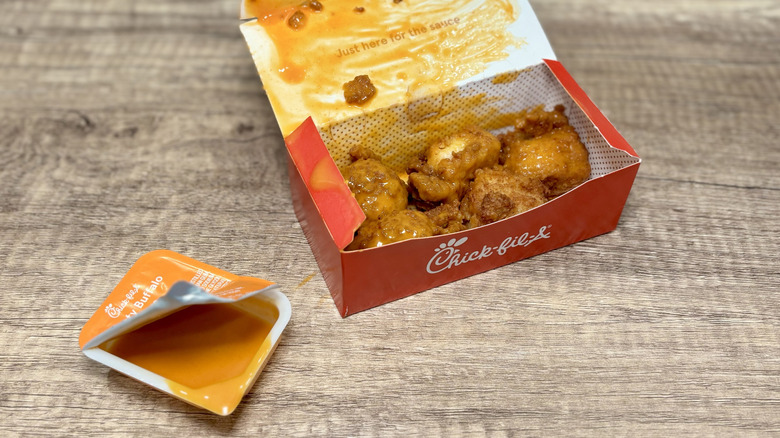 Saucy Boneless Wings in box