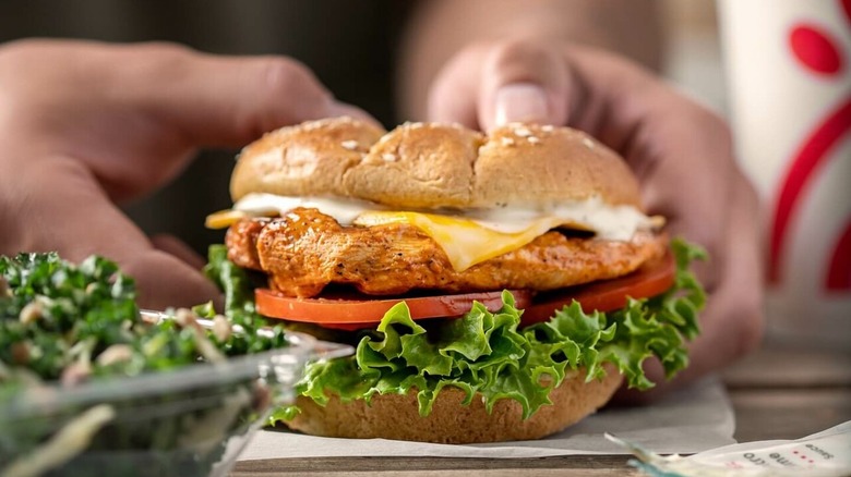 A close up of Chick-fil-A's Grilled Spicy Deluxe Sandwich.