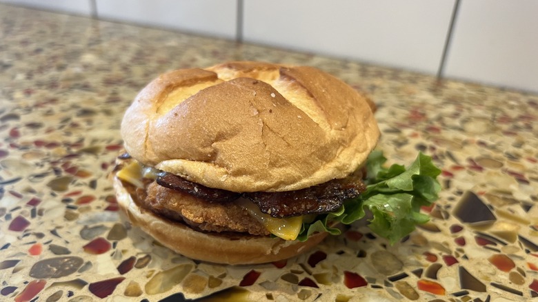 Smokehouse BBQ Bacon Sandwich with Original Filet sits on counter.