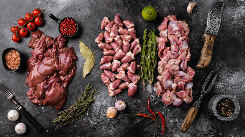 chicken organs on slate with aromatics