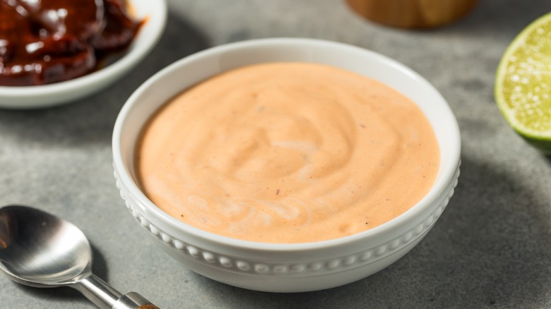 Flavored mayo in white ramekin