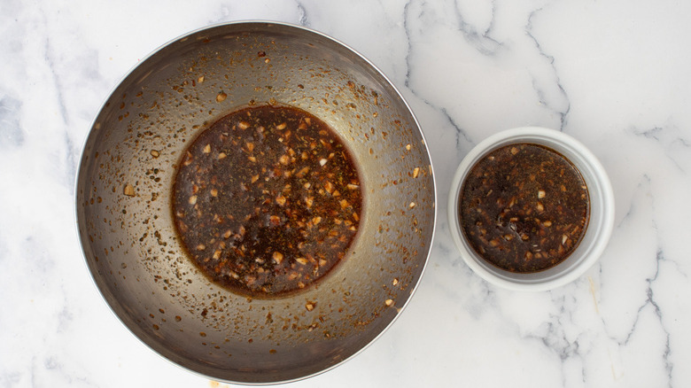 seasonings and liquid in bowls