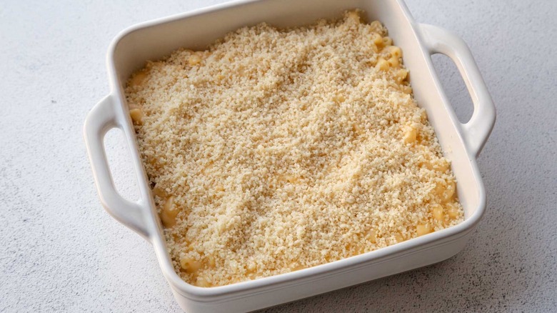 Breadcrumb topped mac and cheese in baking dish