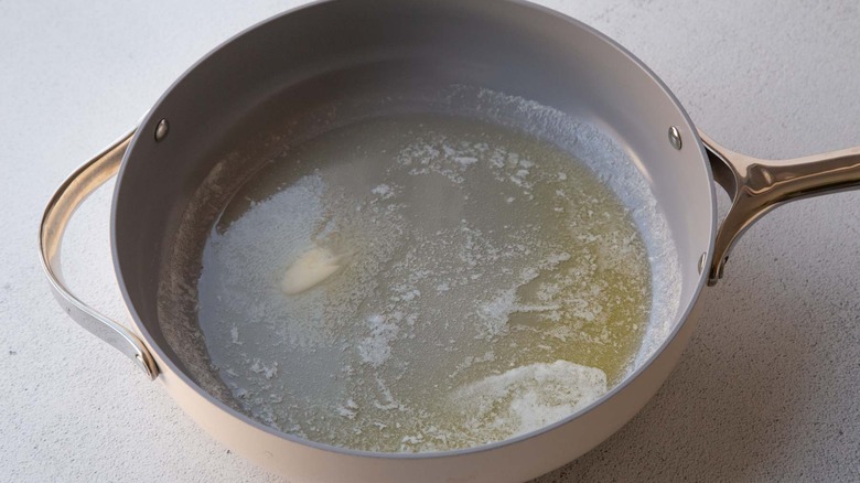 Melted butter in pan