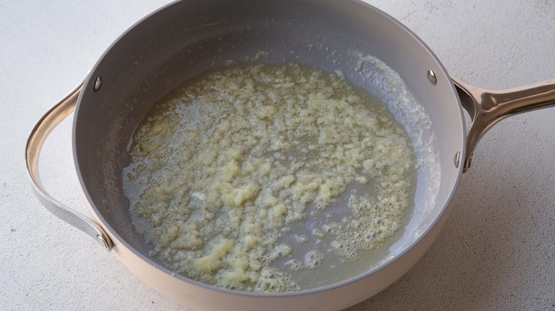 Butter and onion in pan