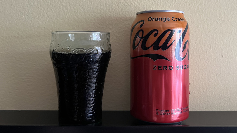 Coca-Cola Zero Sugar Orange Cream can and cola in a glass