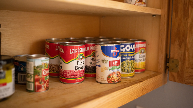 Canned food in cabinet