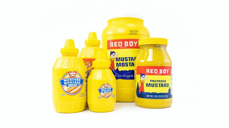 Various yellow containers of mustard