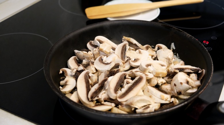 mushrooms in a pan on stovetop