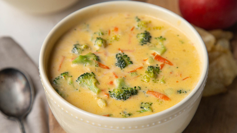 broccoli cheese soup in a white bowl