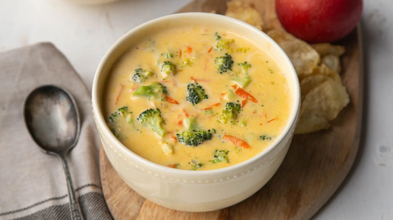 broccoli cheese soup in a white bowl