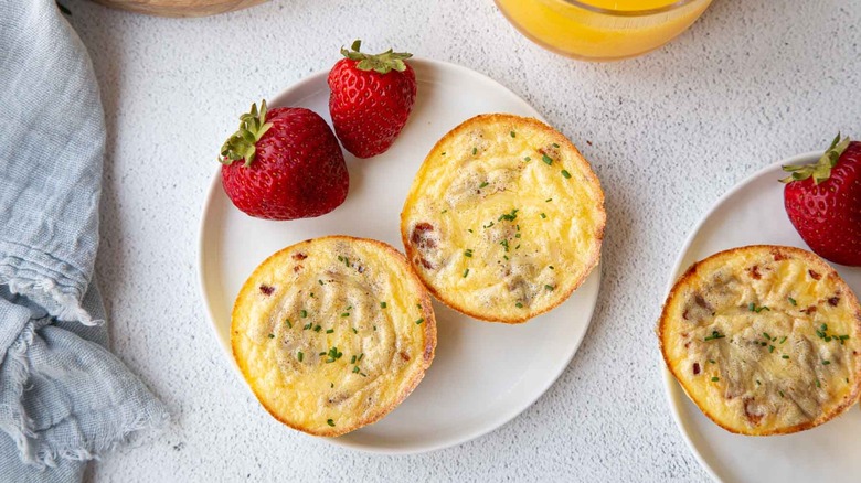 egg bites and strawberries on plate